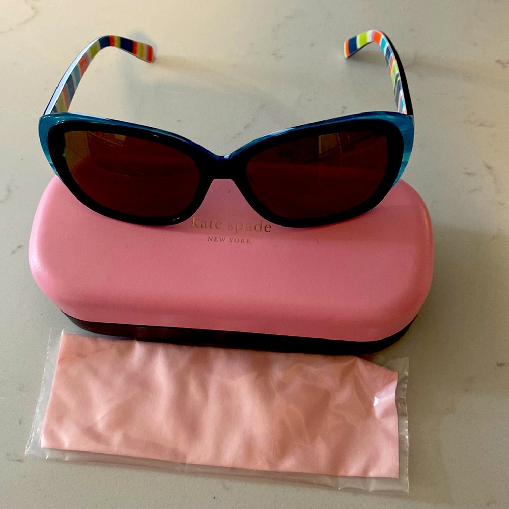 Brand new Kate Spade sunglasses. Received as a gift. Comes with case!
